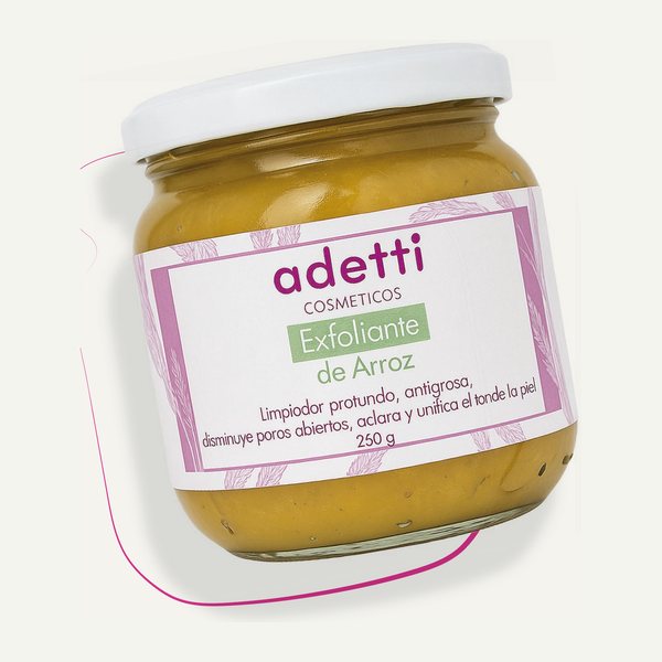 Frasco de vidrio con Exfoliante de Arroz Adetti de 250 g, tapa blanca y pasta color arroz tostado